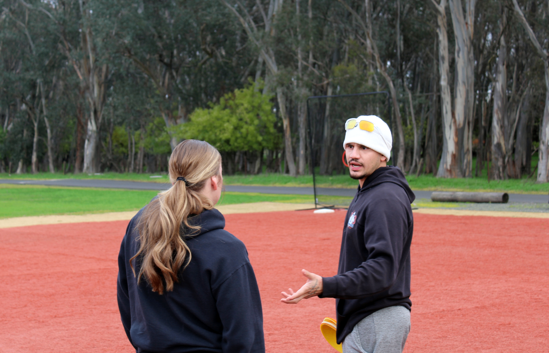 Coach Pete with a young infielder